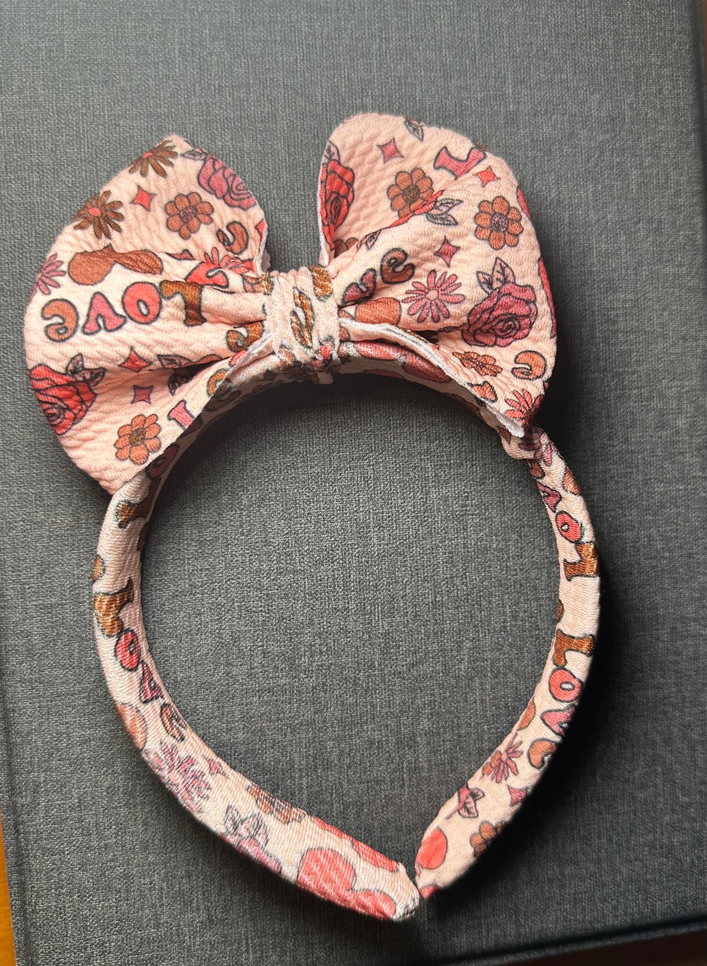 Headband with adjustable bow