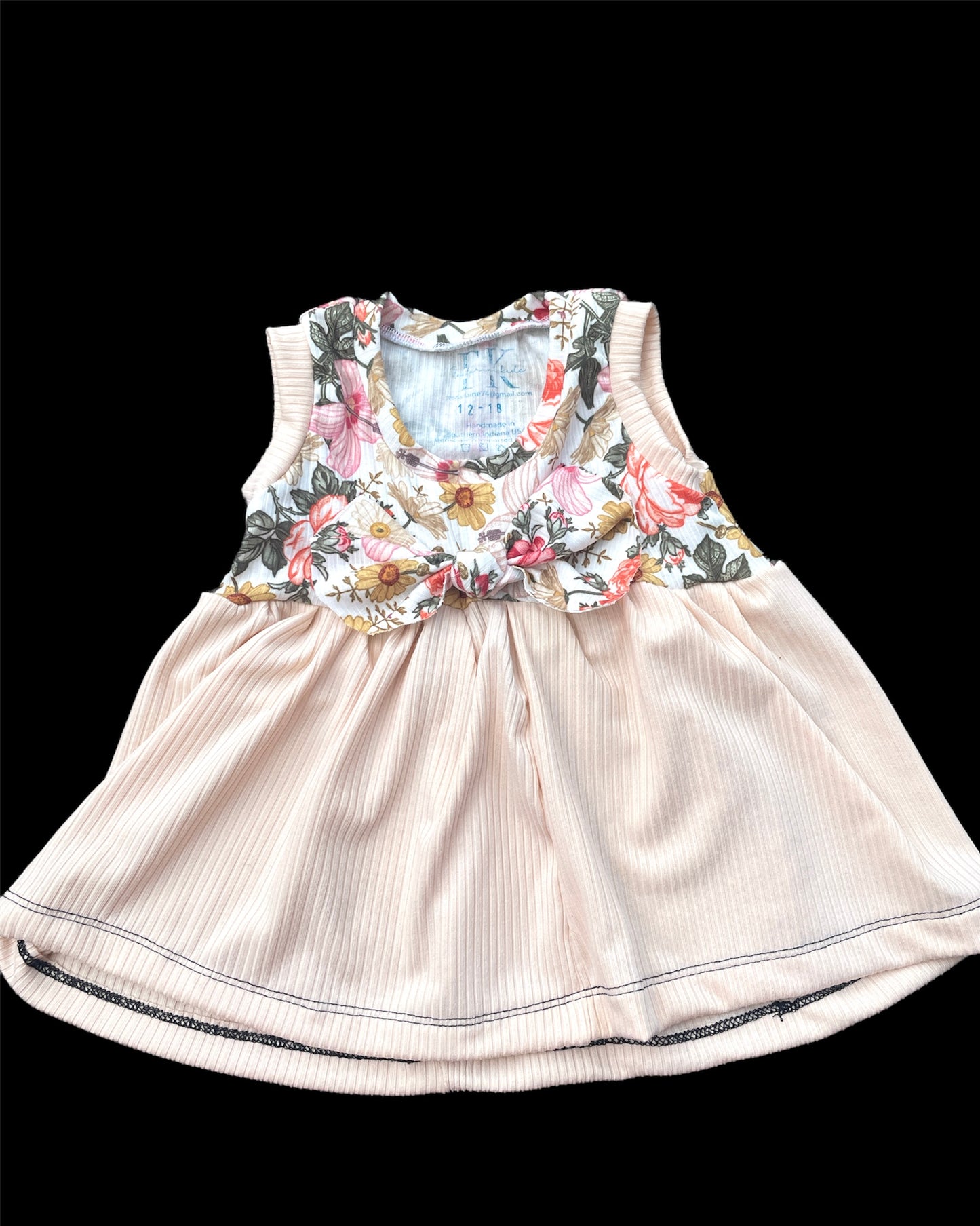 Peplum top w/bow size 12-18m